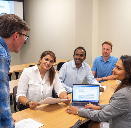 Business professionals collaborating on a project