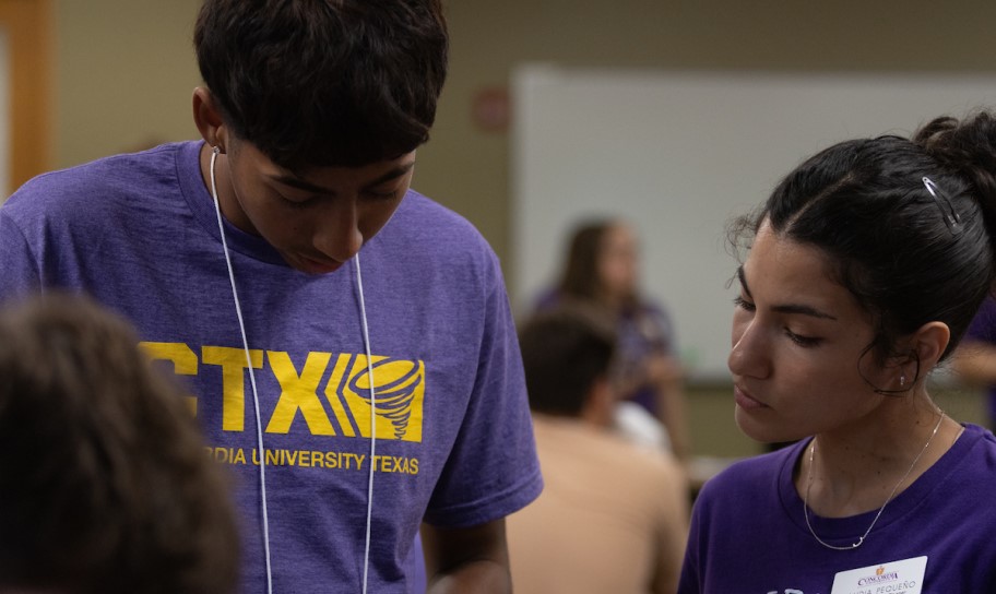 A student being helped by an admissions counselor