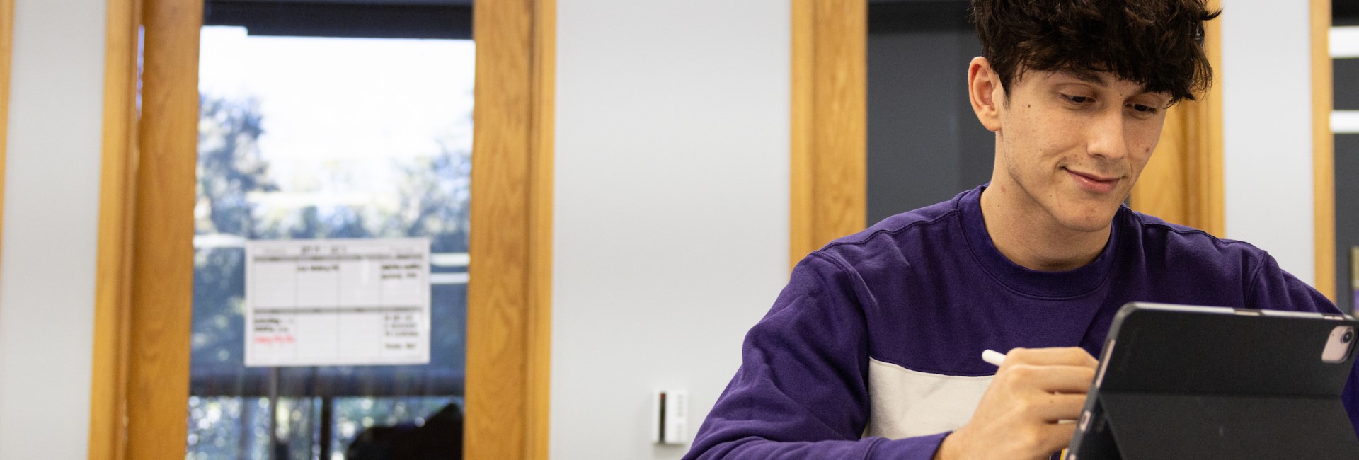 A CTX student working on his BBA