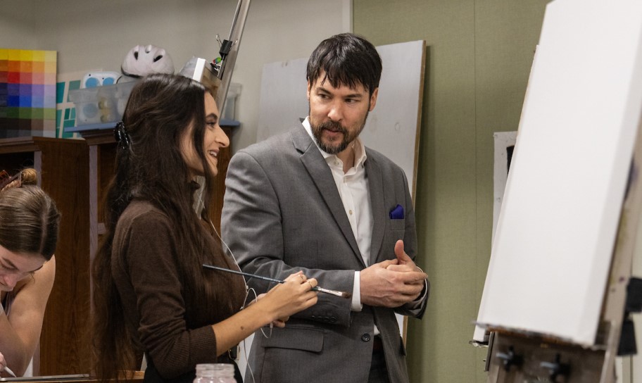 Concordia Texas art professor teaching a in a class