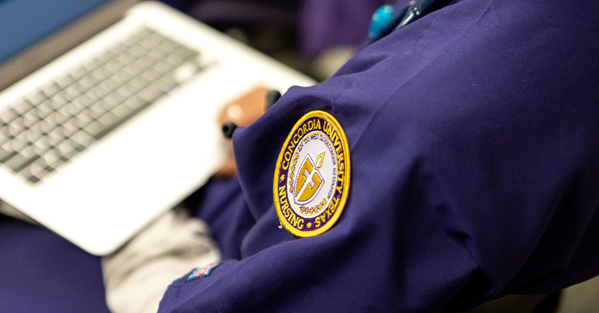 Concordia nursing student on laptop