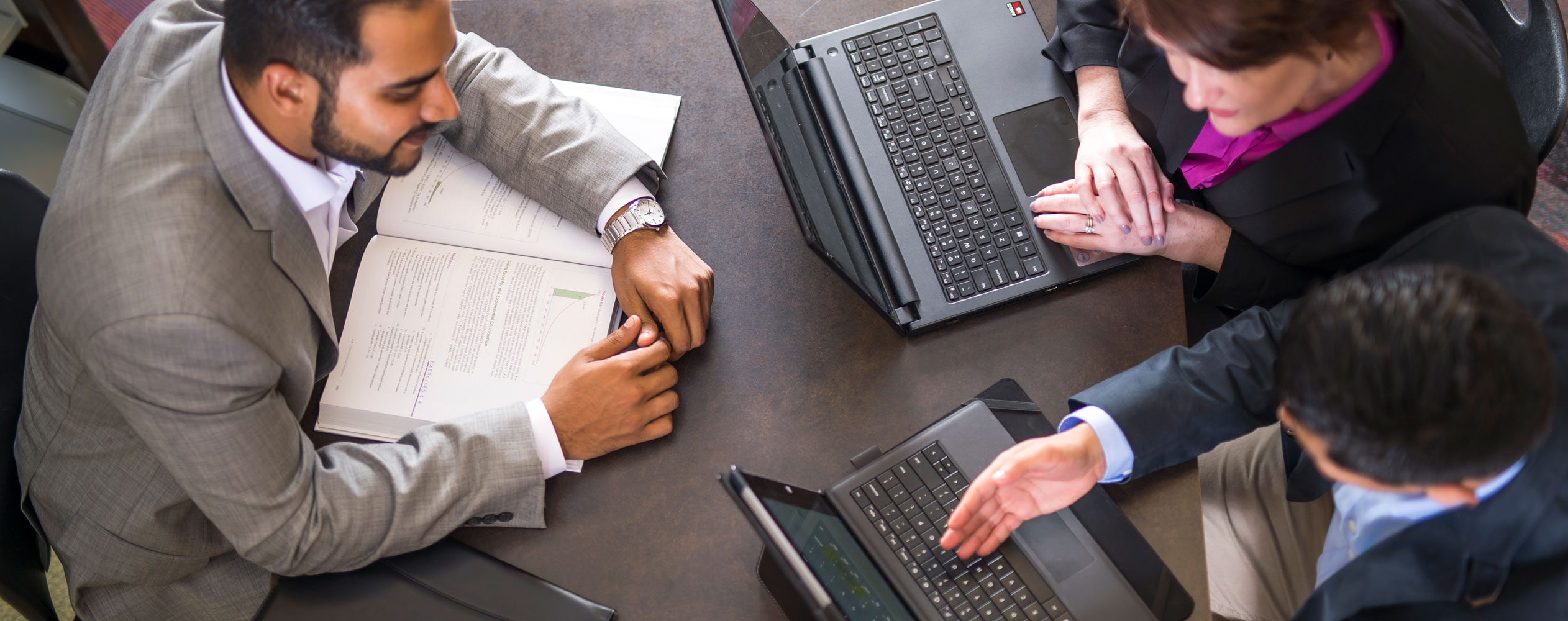 Professionals talking at table