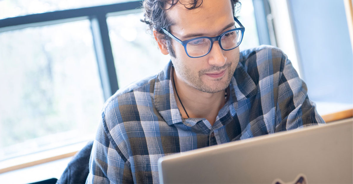 man working on computer