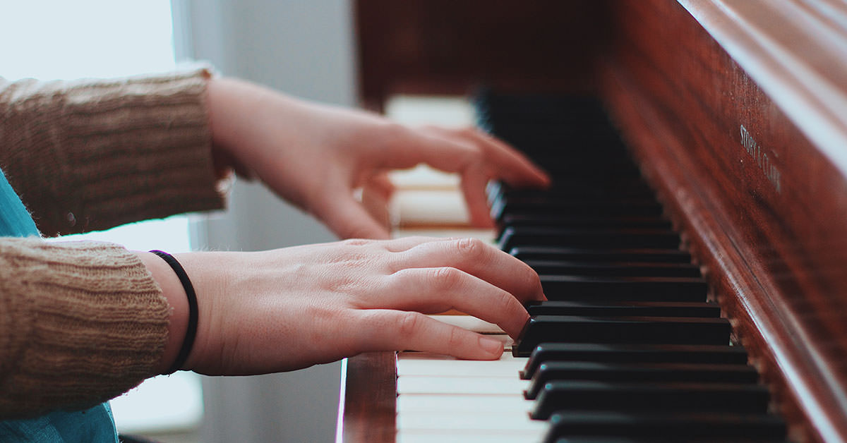 Person Playing Piano