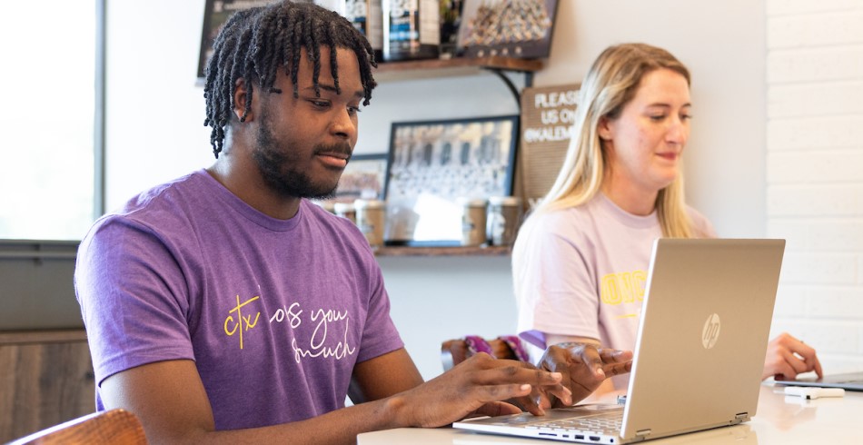 CTX Students working on a storyboard for a project