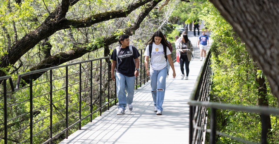 CTX Students walking across the bridge