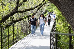 CTX Students walking across the bridge
