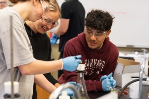 Students working in a biology lab together